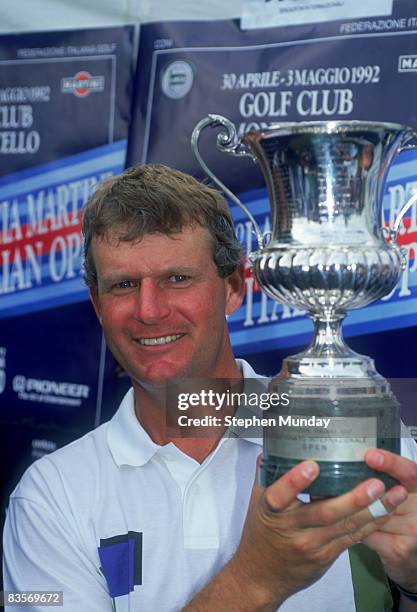 Scottish golfer Sandy Lyle with the trophy after winning the Italian Open at Monticello Golf Club, Milan, May 1992.
