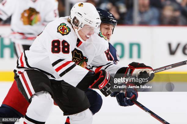 Patrick Kane of the Chicago Blackhawks battles R.J. Umberger of the Columbus Blue Jackets for control of the puck on November 1, 2008 at Nationwide...