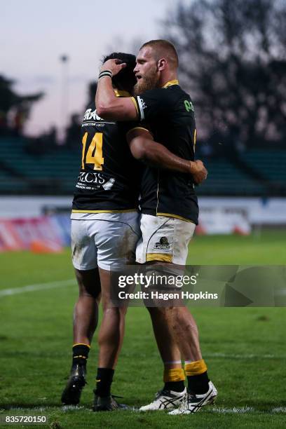 Brad Shields of Wellington congratulates Julian Savea on his try during the round one Mitre 10 Cup match between Manawatu and Wellington at Central...