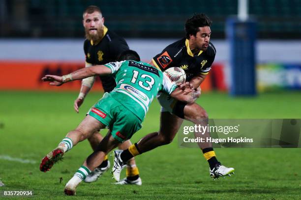 Trent Renata of Wellington is tackled by Lewis Marshall of Manawatu during the round one Mitre 10 Cup match between Manawatu and Wellington at...
