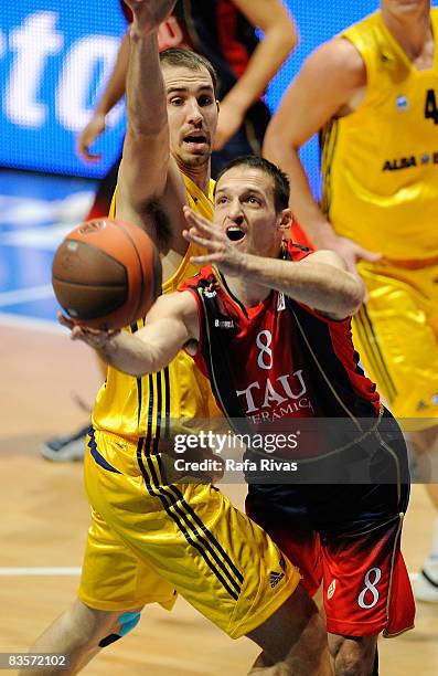 Adam Chubb, #14 of Alba Berlin and Igor Rakocevic, #8 of TAU Ceramica, in action during the Euroleague Basketball Game 3 match between Tau Ceramica...