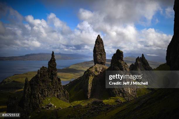 Tourists visit The Storr on the Isle of Skye on August 17, 2017 in Portree, Scotland. The Isle of Skye is known as one of the most beautiful places...