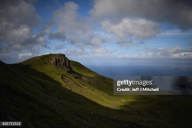 Tourist visit The Storr on the Isle of Skye on August 17, 2017 in Portree, Scotland. The Isle of Skye is known as one of the most beautiful places in...