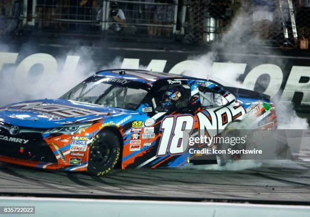 Kyle Busch celebrates winning the 36th annual Food City 300 Xfinity race at Bristol Motor Speedway on August 18,2017