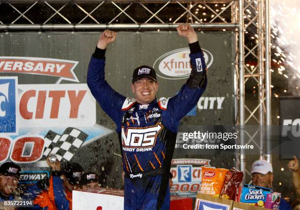 Kyle Busch celebrates winning the 36th annual Food City 300 Xfinity race at Bristol Motor Speedway on August 18,2017