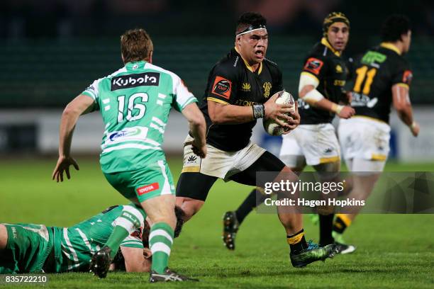 Alex Fidow of Wellington is tackled by Nick Crosswell of Manawatu during the round one Mitre 10 Cup match between Manawatu and Wellington at Central...
