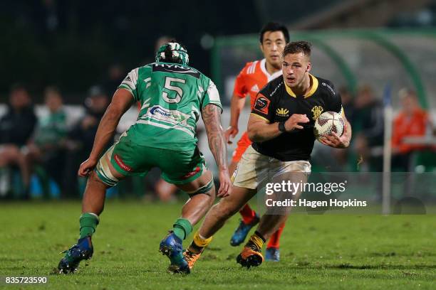 Wes Goosen of Wellington looks to evade Jackson Hemopo of Manawatu during the round one Mitre 10 Cup match between Manawatu and Wellington at Central...