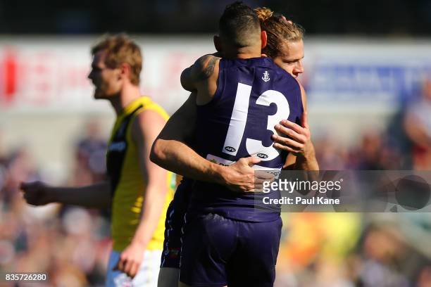 Nathan Fyfe of the Dockers celebrates a goal with Harley Bennell during the round 22 AFL match between the Fremantle Dockers and the Richmond Tigers...