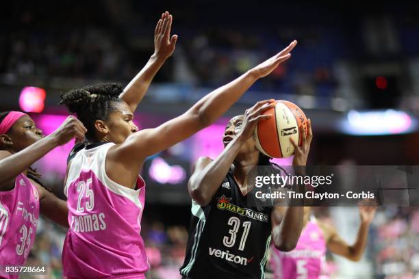 Tina Charles of the New York Liberty is blocked by Alyssa Thomas of the Connecticut Sun during the Connecticut Sun Vs New York Liberty, WNBA regular...