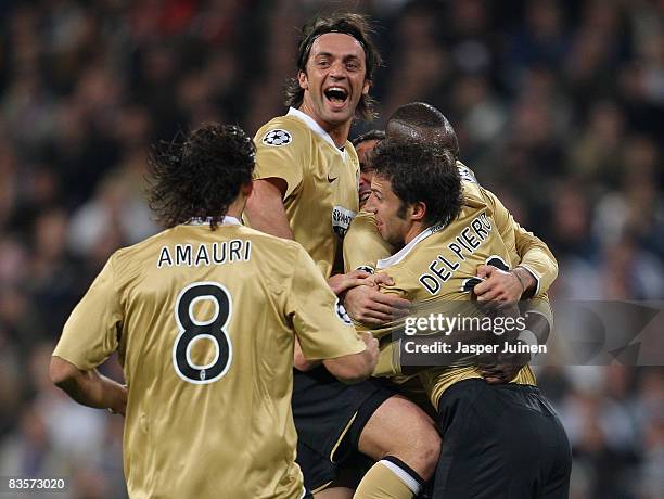 Alessandro Del Piero of Juventus celebrates scoring the opening goal with his teammates during the UEFA Champions League Group H match between Real...