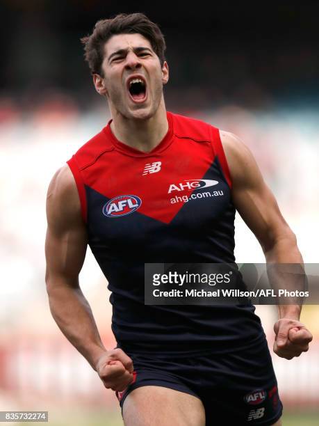 Christian Petracca of the Demons celebrates a goal during the 2017 AFL round 22 match between the Melbourne Demons and the Brisbane Lions at the...