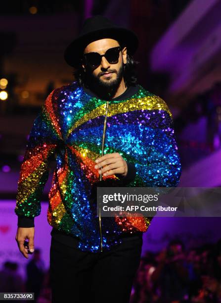 Indian Bollywood acotor Ranveer Singh poses for a photograph during the Lakme Fashion Week Winter/Festive 2017 in Mumbai late on August 19, 2017....