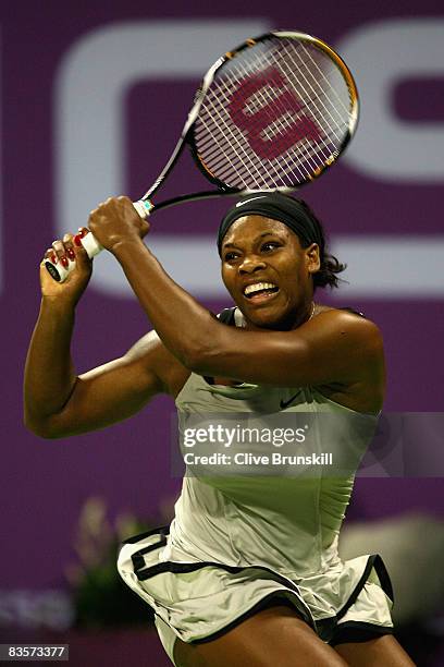 Serena Williams of the USA in action against Dinara Safina of Russia in their round robin match during the Sony Ericsson Championships at the Khalifa...