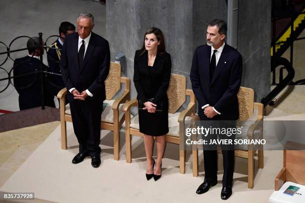 Spain's King Felipe VI and Spain's Queen Letizia and Portugal's President Marcelo Rebelo de Sousa attend a mass to commemorate victims of two...