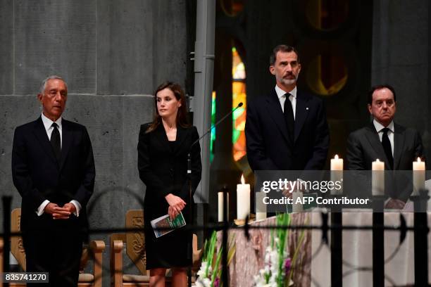 Spain's King Felipe VI and Spain's Queen Letizia and Portugal's President Marcelo Rebelo de Sousa attend a mass to commemorate victims of two...