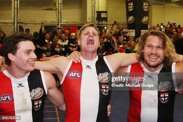 Nick Riewoldt of the Saints sing the club song after winning during the round 22 AFL match between the St Kilda Saints and the North Melbourne...