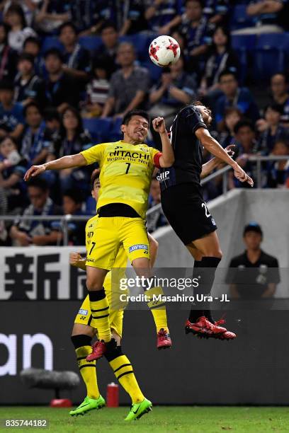 Hidekazu Otani of Kashiwa Reysol and Shun Nagasawa of Gamba Osaka compete for the ball during the J.League J1 match between Gamba Osaka and Kashiwa...