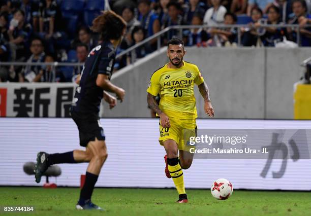 Ramon Lopes of Kashiwa Reysol takes on Hiroki Fujiharu of Gamba Osaka during the J.League J1 match between Gamba Osaka and Kashiwa Reysol at Suita...