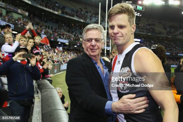 Tearful Nick Riewoldt of the Saints celebrates with his dad Joe after winning during the round 22 AFL match between the St Kilda Saints and the North...