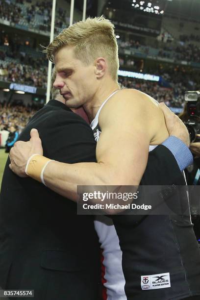 Tearful Nick Riewoldt of the Saints celebrates with his dad Joe after winning during the round 22 AFL match between the St Kilda Saints and the North...