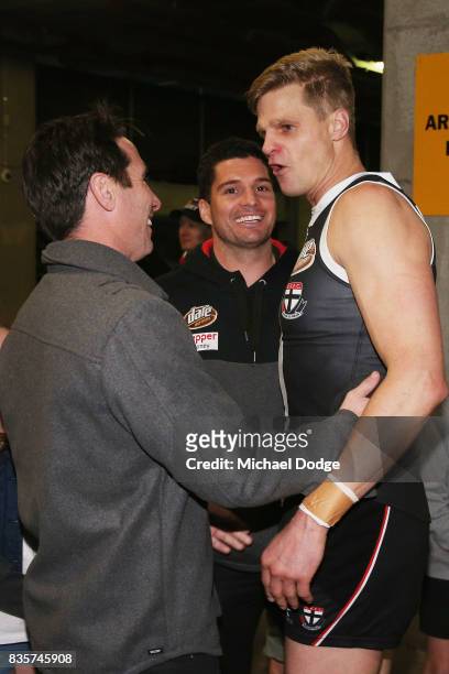 Nick Riewoldt of the Saints celebrates with teammate Leigh Montagna and with former teammate Stephen Milne after winning during the round 22 AFL...
