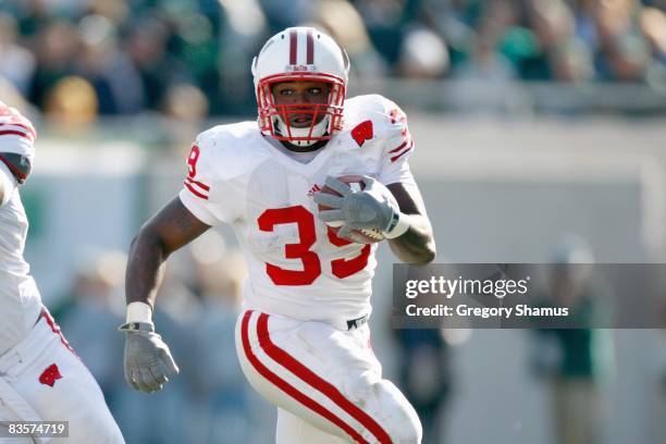 Hill of the Wisconsin Badgers runs the ball during the game against the Michigan State Spartans at Spartan Stadium on November 1, 2008 in East...