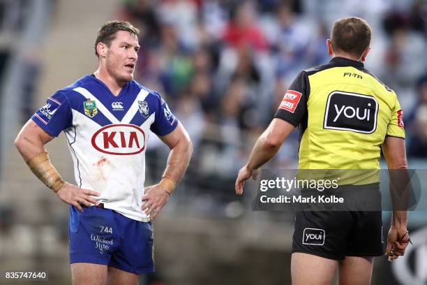 Josh Jackson of the Bulldogs looks at referee Ben Cummins during the round 24 NRL match between the Canterbury Bulldogs and the Manly Sea Eagles at...