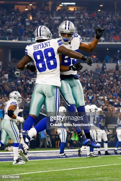 Dallas Cowboys wide receiver Dez Bryant celebrates his touchdown with wide receiver Terrance Williams during the NFL preseason game between the...