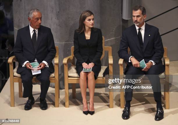 Spain's King Felipe VI and Spain's Queen Letizia and Portugal's President Marcelo Rebelo de Sousa attend a mass to commemorate victims of two...