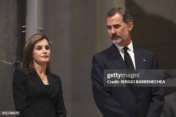 Spain's King Felipe VI and Spain's Queen Letizia attend a mass to commemorate victims of two devastating terror attacks in Barcelona and Cambrils, at...