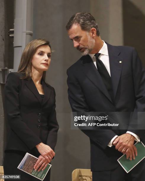 Spain's King Felipe VI and Spain's Queen Letizia attend a mass to commemorate victims of two devastating terror attacks in Barcelona and Cambrils, at...