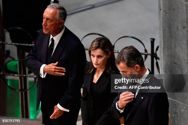 Spain's King Felipe VI and Spain's Queen Letizia and Portugal's President Marcelo Rebelo de Sousa attend a mass to commemorate victims of two...