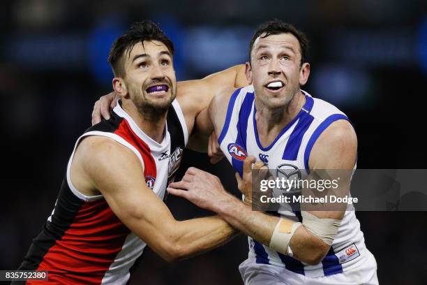 Billy Longer of the Saints and Todd Goldstein of the Kangaroos compete for the ball during the round 22 AFL match between the St Kilda Saints and the...