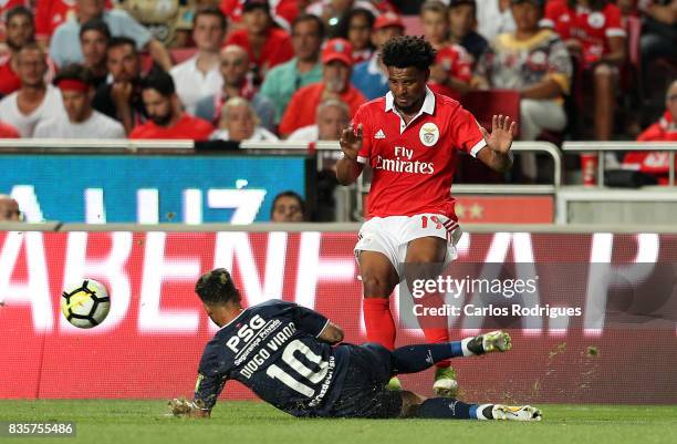 Os Belenenses forward Diogo Viana from Portugal tackles Benfica's defender Eliseu from Portugal during the match between SL Benfica and CF Belenenses...