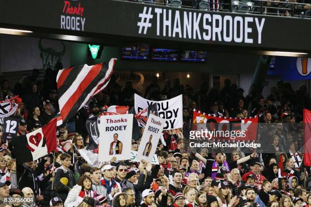 Saints fans show their support for Nick Riewoldt of the Saints during the round 22 AFL match between the St Kilda Saints and the North Melbourne...