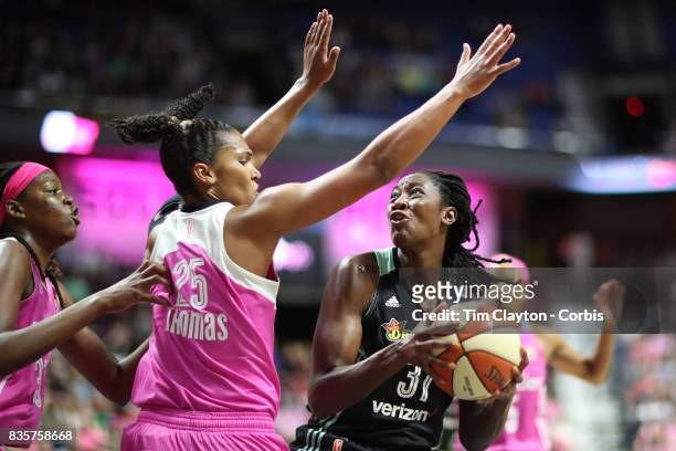 Tina Charles of the New York Liberty is defended by Alyssa Thomas of the Connecticut Sun during the Connecticut Sun Vs New York Liberty, WNBA regular...
