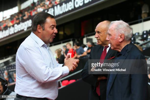 Olivier Delcourt of Dijon, Rene Ruello and Francois Pinault of Rennes during the Ligue 1 match between Stade Rennais and Dijon FCO at Roazhon Park on...