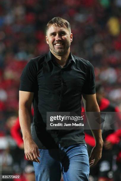 Eduardo Coudet coach of Tijuana smiles during the fifth round match between Tijuana and Santos Laguna as part of the Torneo Apertura 2017 Liga MX at...