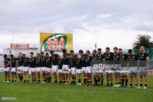 Wellington players observe a moment of silence in memory of former All Black Sir Colin Meads during the round one Mitre 10 Cup match between Manawatu...