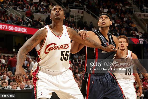 Lorenzen Wright of the Cleveland Cavaliers and Jared Dudley of the Charlotte Bobcats battle for position during the game at Quicken Loans Arena on...