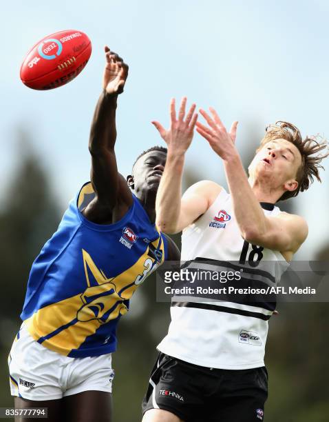 Buku Khamis of the Western Jets taps the ball during the TAC Cup round 16 match between the Northern Knights and the Western Jets at RAMS Arena on...