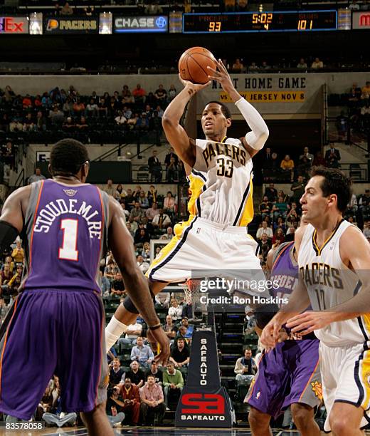 Danny Granger of the Indiana Pacers shoots over Amare Stoudemire of the Phoenix Suns at Conseco Fieldhouse on November 5, 2008 in Indianapolis,...