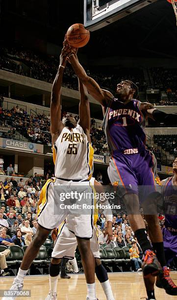 Roy Hibbert of the Indiana Pacers battles for the ball with Amare Stoudemire of the Phoenix Suns at Conseco Fieldhouse on November 5, 2008 in...