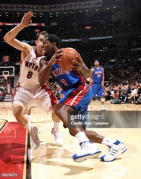 Rodney Stuckey of the Detroit Pistons battles opposing guard Jose Calderon of the Toronto Raptors in a game on November 5, 2008 at the Air Canada...