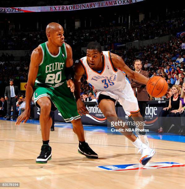 Kevin Durant of the Oklahoma City Thunder goes to the basket while being guarded by Ray Allen of the Boston Celtics at the Ford Center on November 5,...