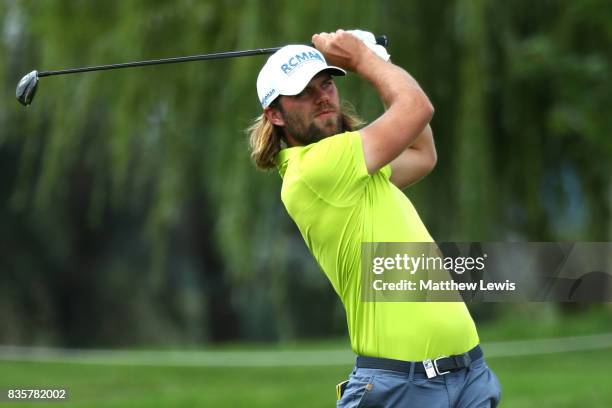 Johan Carlsson of Sweden hits his second shot on the 3rd hole during the 3rd/4th place playoff match of the Saltire Energy Paul Lawrie Matchplay at...