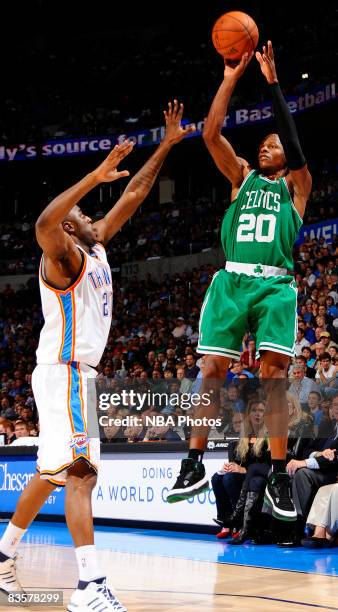 Ray Allen of the Boston Celtics shoots a jump shot against Jeff Green of the Oklahoma City Thunder at the Ford Center on November 5, 2008 in Oklahoma...