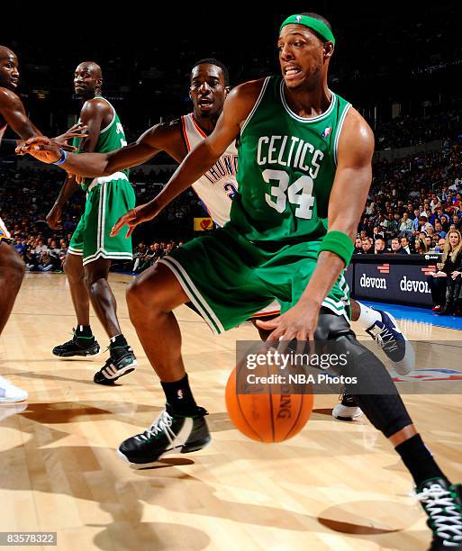 Paul Pierce of the Boston Celtics goes to the basket while being guarded by Jeff Green of the Oklahoma City Thunder at the Ford Center on November 5,...