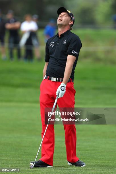 Marcel Siem of Germany reacts to his second shot on the 3rd hole during the final match of the Saltire Energy Paul Lawrie Matchplay at Golf Resort...