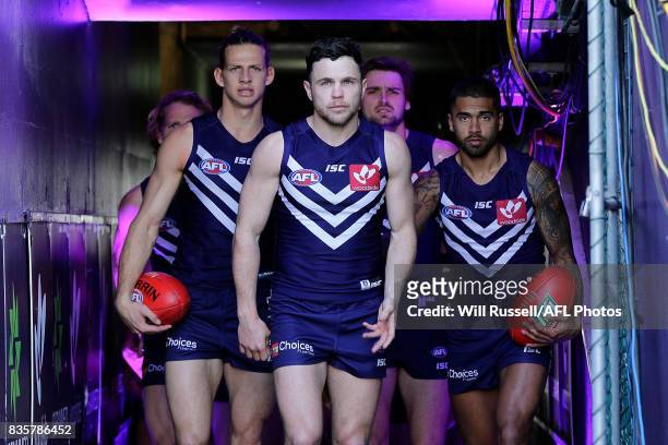 Hayden Ballantyne of the Dockers walks on for his 150th game during the round 22 AFL match between the Fremantle Dockers and the Richmond Tigers at...